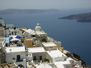 The Santorini volcano caldera fomed by a cataclysmic eruption in 1650 BC/ zaragkito